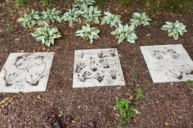 The Burrow family's handprints at the MND Centre as a homage to Rob Burrow 