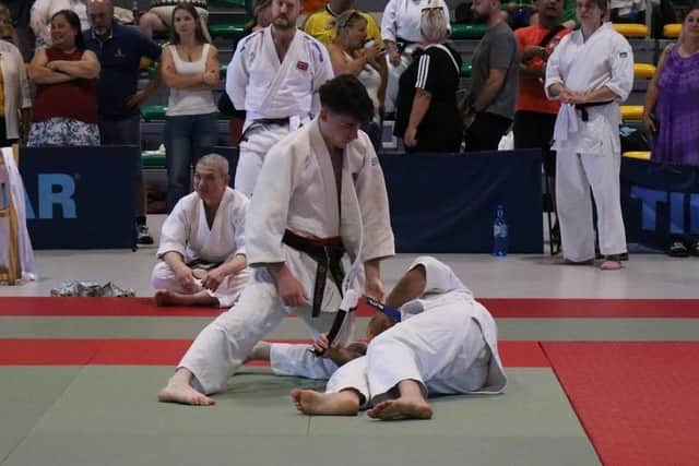 Ethan David executes a throw during the Sport Aikido World Championships Randori event.