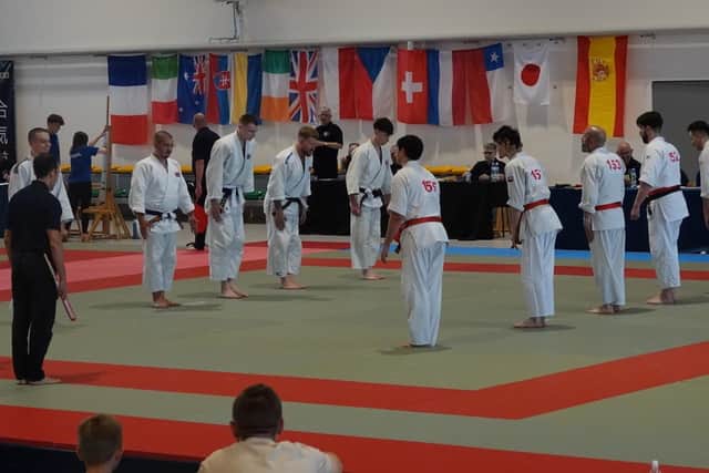 Gold-winning Great Britain team (Left) bow to Spain before the Team Randori event.