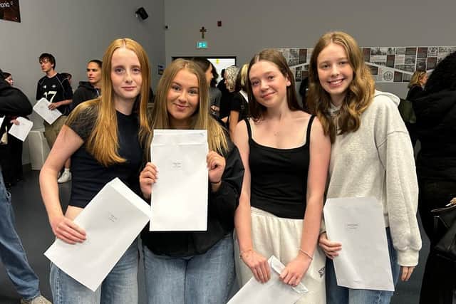 Students receive their GCSE results at Abbey Grange Academy