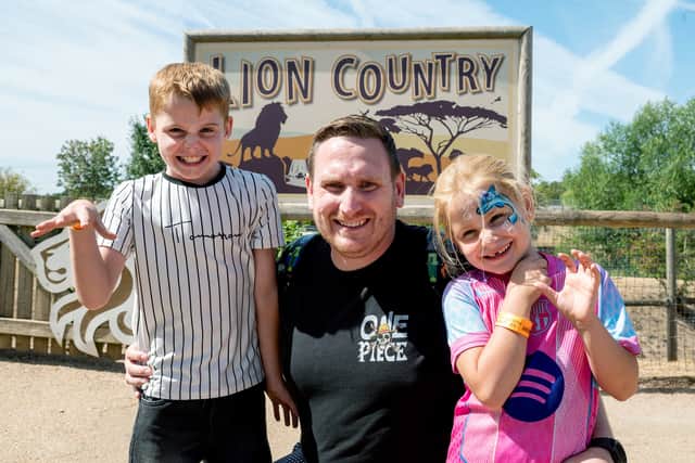 Ready for Lion Country is Trevor Roper with Leo and Erin.