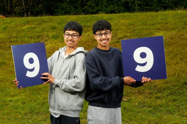 GSAL twins Lokesh and Lochan celebrate receiving top GCSE results.