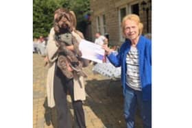 Anchor's Manor House Roundhay presents the award for the Scruffiest & Fluffiest