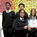 Geography students at Bishop Young CofE Academy proudly present their Geographical Association Secondary Geography Quality Mark certificate.