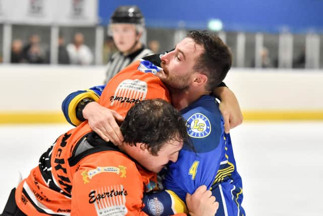 LEADING ROLE: Sam Zajac drops the gloves during Sunday's defeat at Telford Tigers. Picture courtesy of Steve Brodie.