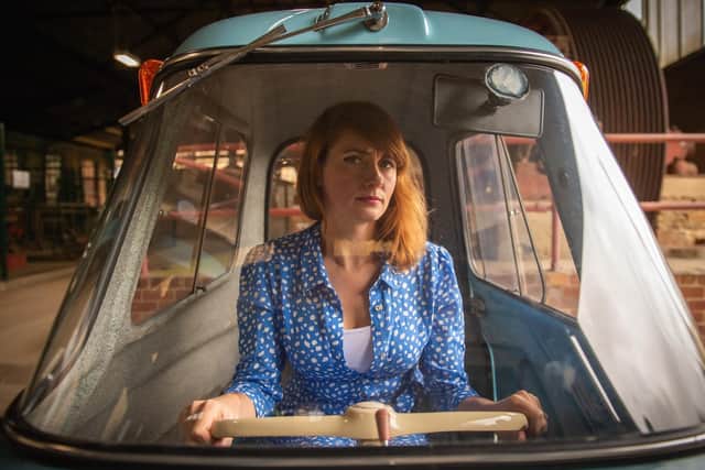 Gina Churchill-Straffon of Leeds Museums and Galleries with the Scootacar