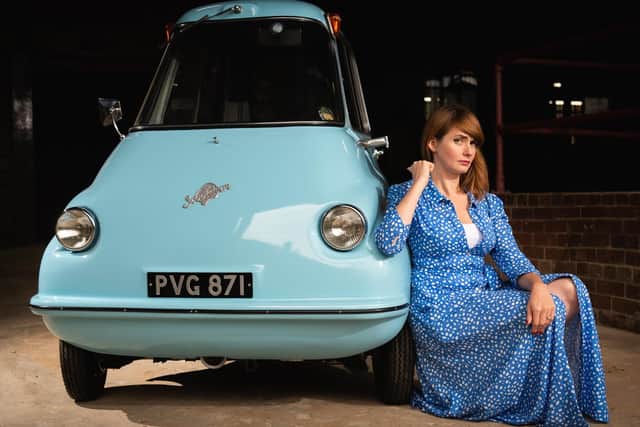 Gina Churchill-Straffon of Leeds Museums and Galleries with the Scootacar