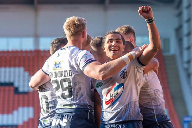 Picture by Allan McKenzie/SWpix.com - 18/05/2019 - Rugby League - Betfred Championship Summer Bash 2019 - Featherstone Rovers v York City Knight - Bloomfield Road, Blackpool, England - Featherstone's Ashton Golding celebrates Bradley Day's try against York.