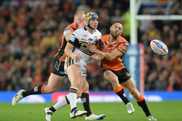 SO CLOSE: Luke Gale is clattered by Leeds Rhinos' Jack Walker in the 2017 Grand Final at Old Trafford which Castleford lost.  Picture: Bruce Rollinson