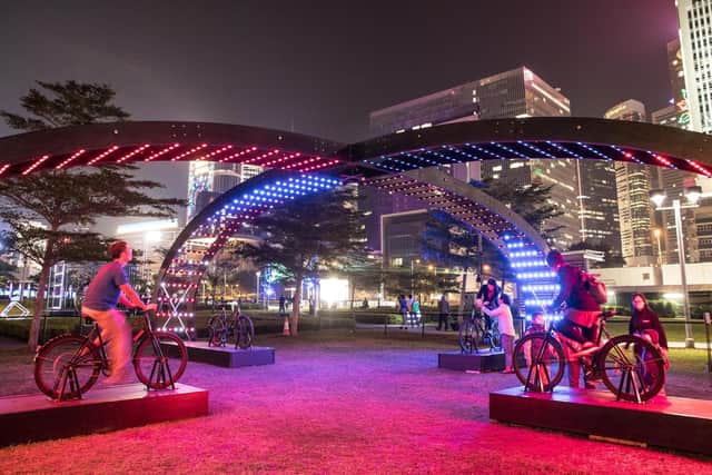 Lightbattle X challenges visitors to mount one of four bikes and compete to see who can push a beam of light to the middle the fastest. PIC: VENIVIDIMULTIPLEX