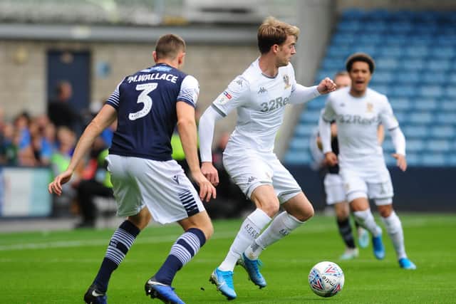 Patrick Bamford is challenged by Millwall's Murray Wallace. Picture: Simon Hulme.