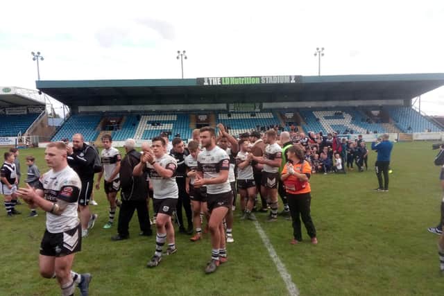 Disappointed Stanningley players salute their fans after the promotion final defeat.