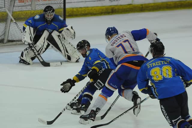 ON THE BACKFOOT: Leeds Chiefs' player-coach Sam Zajac blocks the path of Peterborough Phantoms' Martins Susters on Sunday evening. Picture: David Lowndes.