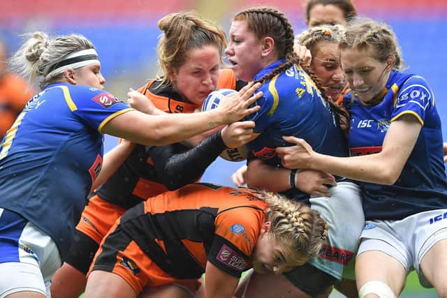 Leeds Rhinos' Danni Anderson is tackled during the Challenge Cup final against Castleford Tigers.