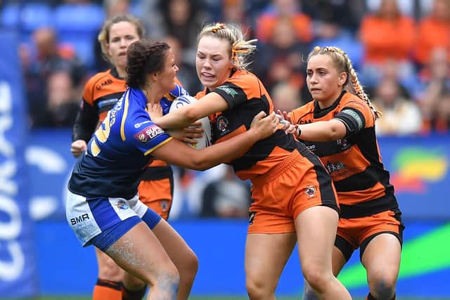 Castleford Tigers' Hollie-Mae Dodd is tackled during this year's Challenge Cup final clash with Leeds Rhinos.