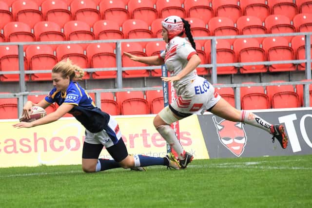 Leeds Rhinos try machine Abby Eatock touches down for the winning score against St Helens. PIC: Garry Beevers