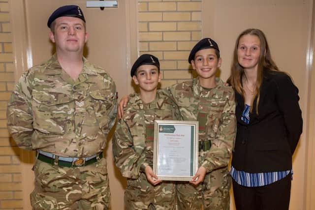 L-R  Sgt Cameron Tosh, of the Army Cadets, Connor Osborne, Jack Smith and Mum Emma Osborne.