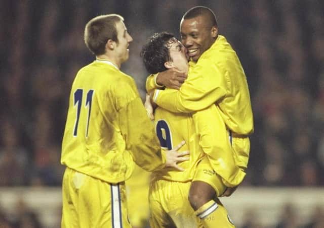 FEBRUARY 1997: Rod Wallace celebrates his goal for Leeds with teammates Gary Kelly and Lee Bowyer during the FA Cup fourth round tie against Arsenal at Highbury. PIC: Getty