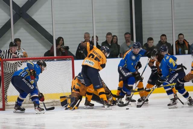 UNDER PRESSURE: Leeds Chiefs try to foce an opening in the Raiders zone. Picture courtesy of John Scott