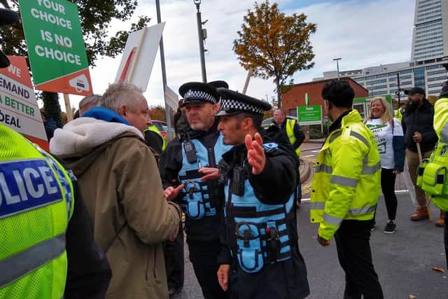 There were heated scenes as protesters were stopped from entering the Asda House forecourt.