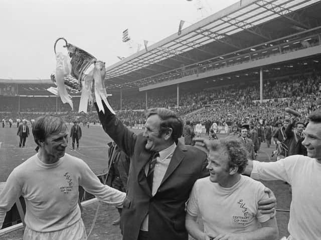 Leeds United manager Don Revie lifts the 'FA Cup' trophy after his players beat Arsenal to win in 1972. Also shown are Jack Charlton (left), Billy Bremner (1942 - 1997), and Paul Reaney (far right). (Picture: Getty Images)