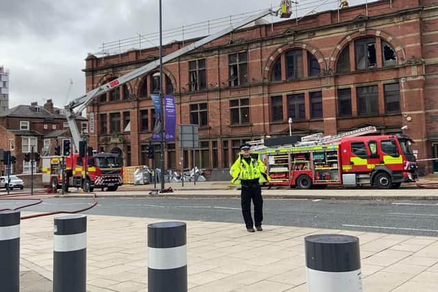 Fire fighters at the scene of fire at Capita building on Clay Pit Lane in Leeds