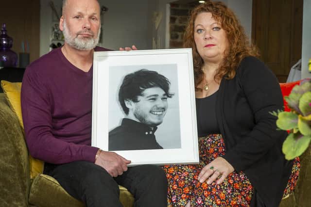 Andrew and Joanne Doody, with a portrait of their son Peter who died suddenly in May at the age of 21. His parents, forming the Peter Doody Foundation, hope to raise awareness of sudden unexpected death in epilepsy and support other families. Picture Tony Johnson