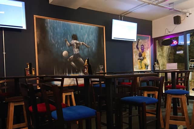 Some of the artwork inside Mr Schnapps Sports Bar.
