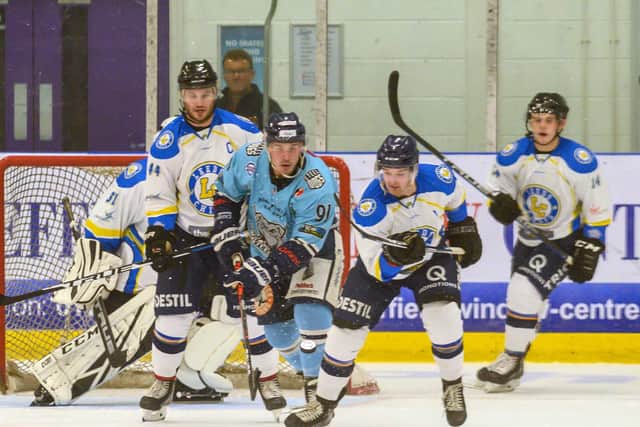 Leeds Chiefs clear their lines under pressure from the Sheffield Steeldogs during the first period at Ice Sheffield. Picture: Bruce Rollinson.