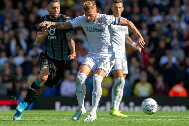 DREAM TEAM: Ben White looks on as Liam Cooper challenges Swansea City's Borja Baston. Picture by Bruce Rollinson.