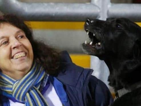 Leeds United fan Nikki Allan with her guide dog Rita - who will be replaced by a younger guide dog on Saturday