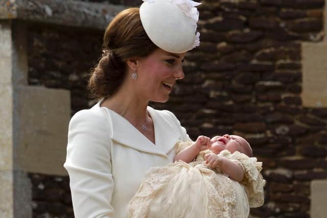 he Duchess of Cambridge carries Princess Charlotte as they arrive at the Church of St Mary Magdalene in Sandringham, Norfolk, for the 2015 christening (Photo: Matt Dunham/PA Wire)