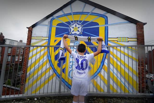 A young Leeds fan takes in the mural (Photo: Gary Longbottom).