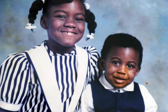 Boxing champion Nicola Adams aged seven with her brother Kurtis, aged two.