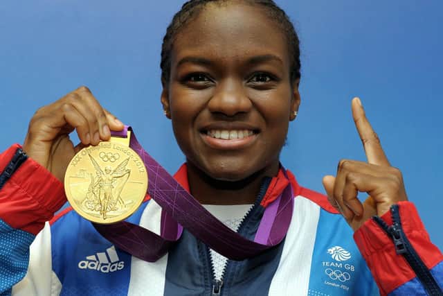 Nicola Adams celebrates gold at the London Olympics in 2012. PIC:PA