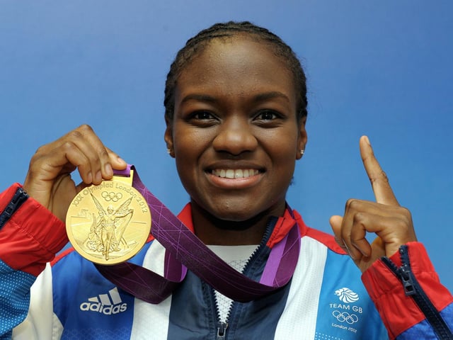 A golden smile after Nicola beat Chinas Ren Cancan to take flyweight gold in front of a raucous home crowd on one of that marvellous summer of sports very best days.