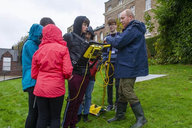 Pupils from Fulneck School Pudsey, use specialist equipment to look underground as part of a physics project.