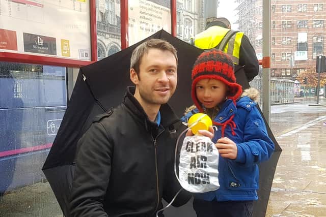 Campaigner Evan Holm with his 4-year-old son James