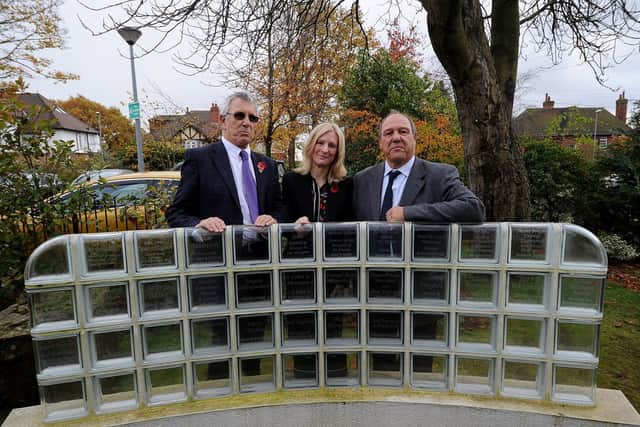 Unveiling of brick for Arthur Louis Arron at St Gemmas Hospice, Leeds. Pictured from the left are Dr Stewart Manning, ,Louise Escott, Michael Manning.
