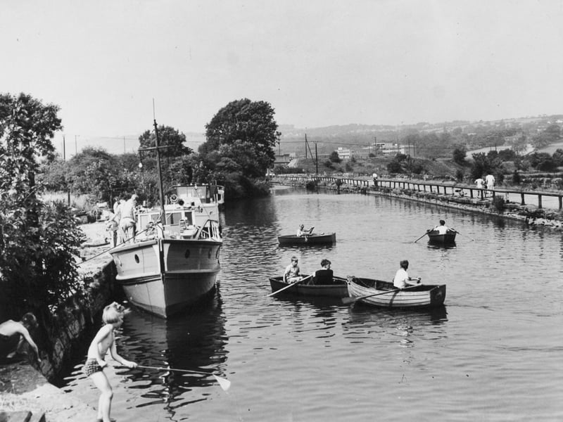 Youngsters having fun at the Leeds and Liverpool Canal in October 1950