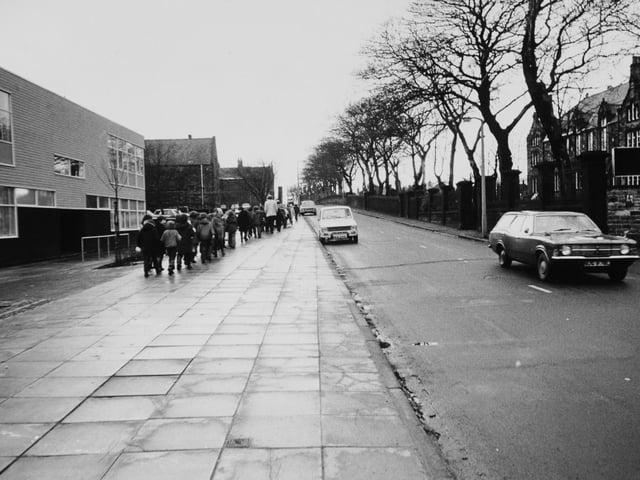 Pupils make their way to school along Hough Lane.