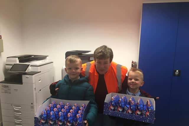 Alfie (left) and Joey went to deliver the chocolate in person to the Leeds South and East Food Bank, who were thrilled by their act of selflessness and kindness. Picture: Leeds South and East Food Bank
