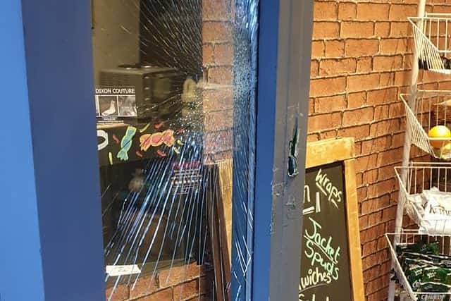 The suspects smashed the door. Photos provided by owners of the business.