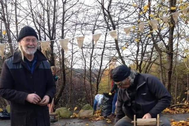 People using tools in during a Hyde Park Source project.