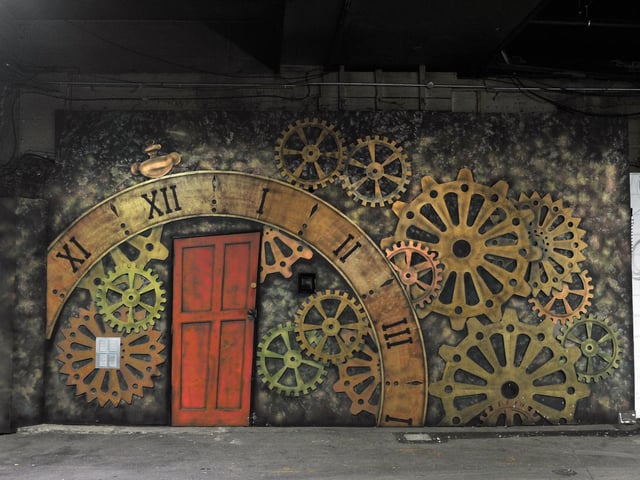 Art on the walls of the Dark Arches.