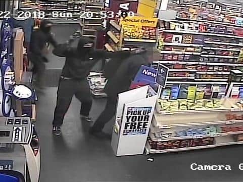 CCTV from West Yorkshire Police of terrifying armed robbery at Tesco Express in Cookridge, April 2018.