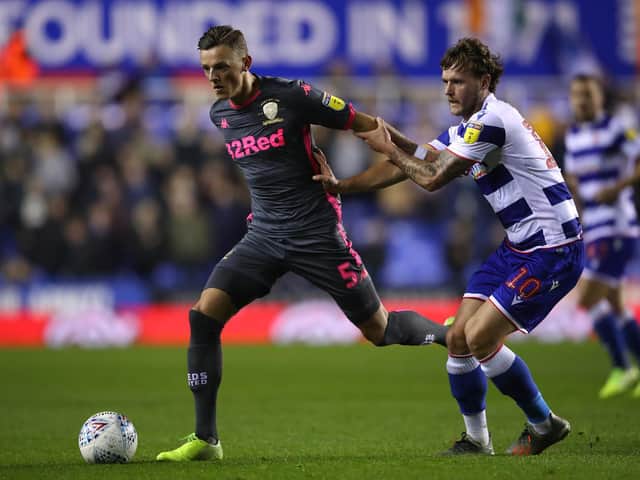 CLASS ACT: Leeds United's Brighton loanee Ben White is challenged by John Swift during Tuesday night's 1-0 win at Reading. Photo by Warren Little/Getty Images.