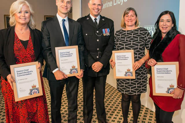 Dr Catherine Lloyd, Dr Ian Sanderson, Nurse Tina Riordan and member of the public Melanie Smith, receive their District Chief Superintendent's Commendations from Chief Supt Steve Cotter, of West Yorkshire Police.