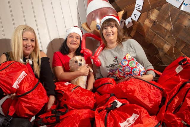 Shelly and Becky Joyce and Fiona Willis from Street Paws at the gift-wrapping event