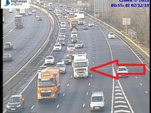 Stranded HGV on the M1 near Leeds, which is causing delays on the northbound carriage
